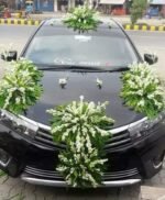 আপনি আপনার বিয়ের গাড়িটা কম দামের মধ্যে গর্জিয়াস করে সাজাতে চান তাহলে এখনি আমাদের সাথে যোগাযোগ করুন আমাদের ঠিকানা হচ্ছে ঢাকা গুলশান১ ডিসিসি মার্কেট এর সামনে - Image 2